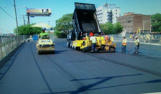 Workers Doing Road Construction